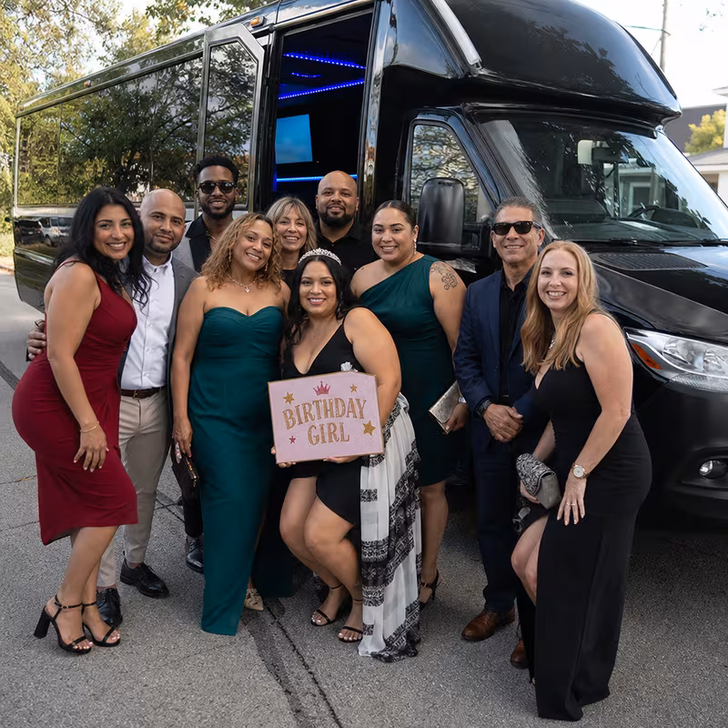 Group boarding a white charter bus for Birthday Transportation transportation in Queens