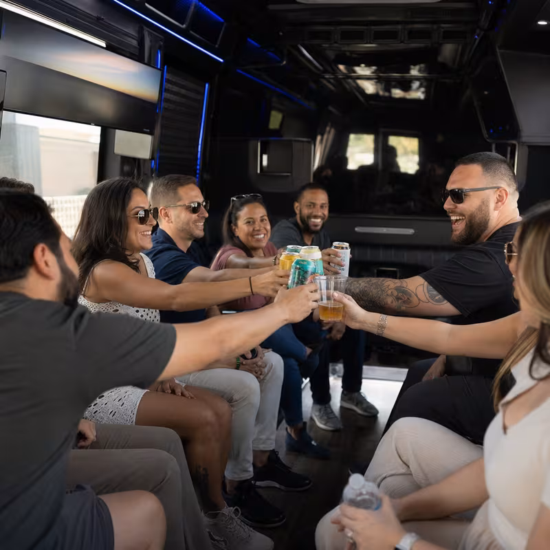 Group boarding a white charter bus for Winery & Brewery Tour Transportation transportation in Queens